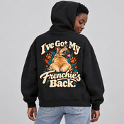 Woman wearing a black French Bulldog hoodie with the I've Got My Frenchie's Back back print.