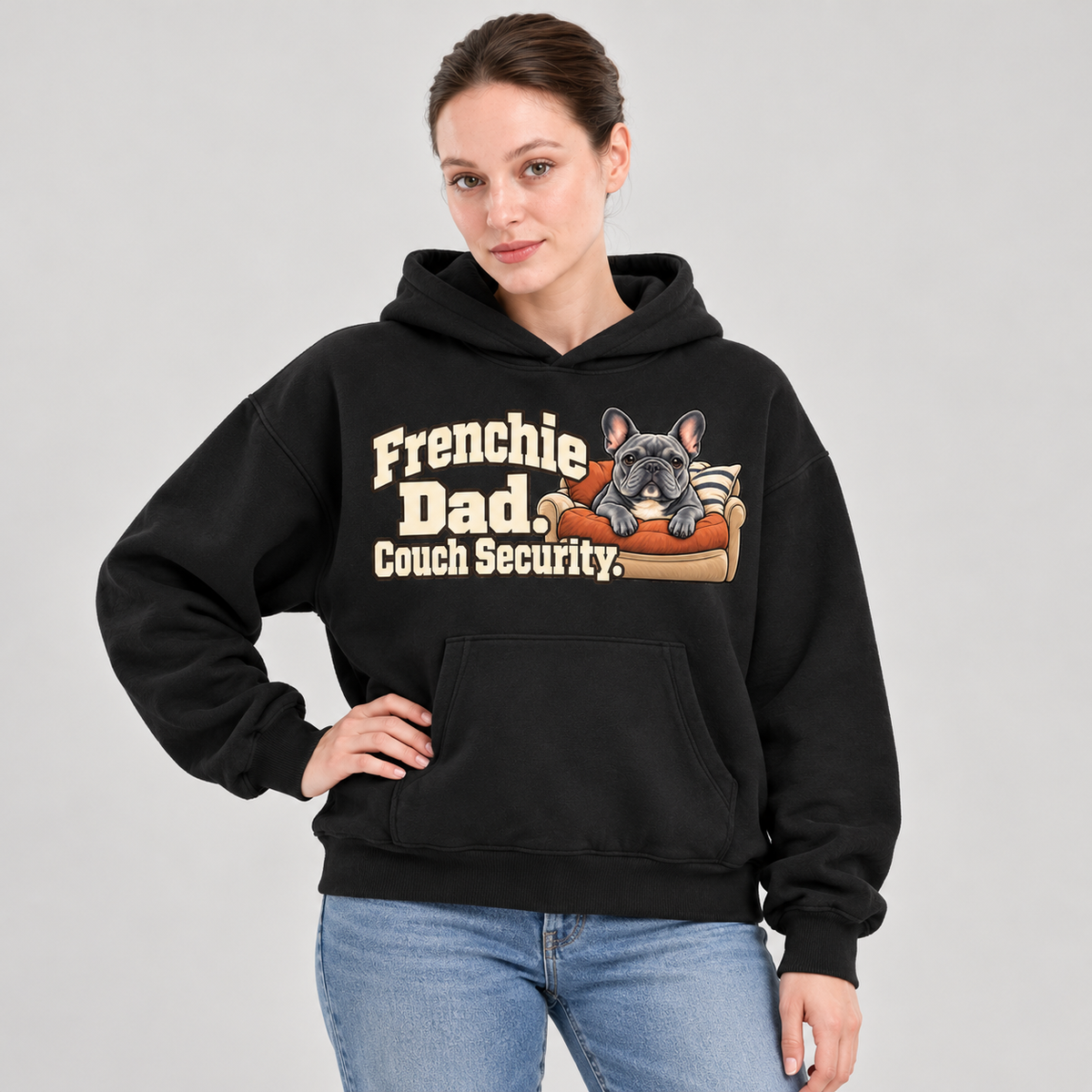 Woman wearing a black French Bulldog hoodie with the Frenchie Dad. Couch Security front print.