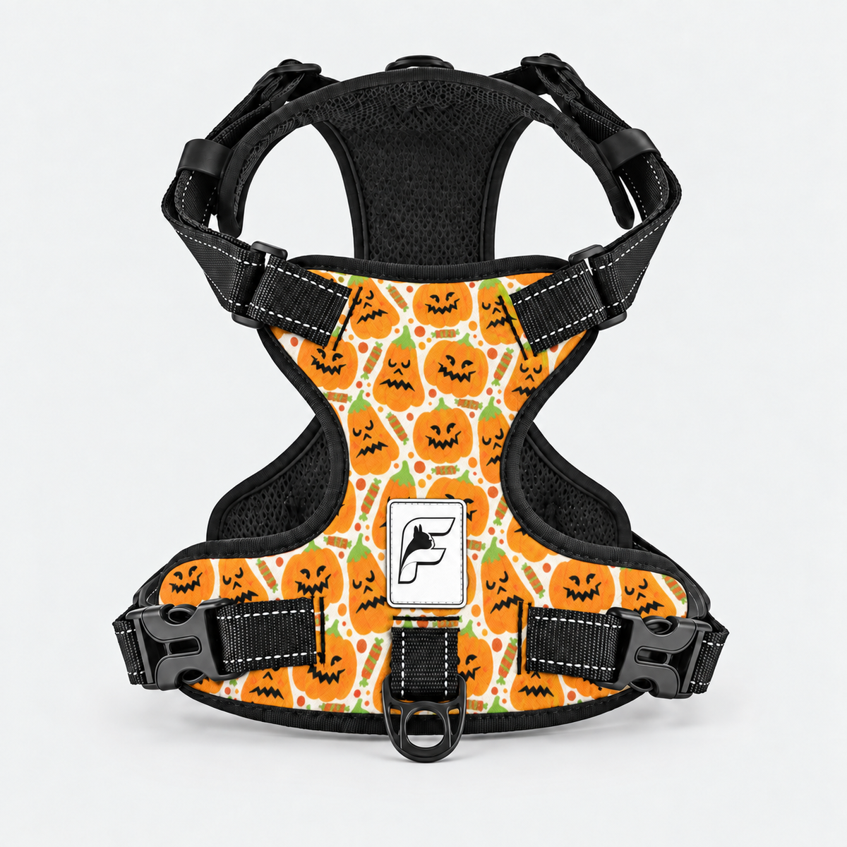Jack-O-Lantern French Bulldog harness, orange no-pull vest with carved pumpkin print and black trim