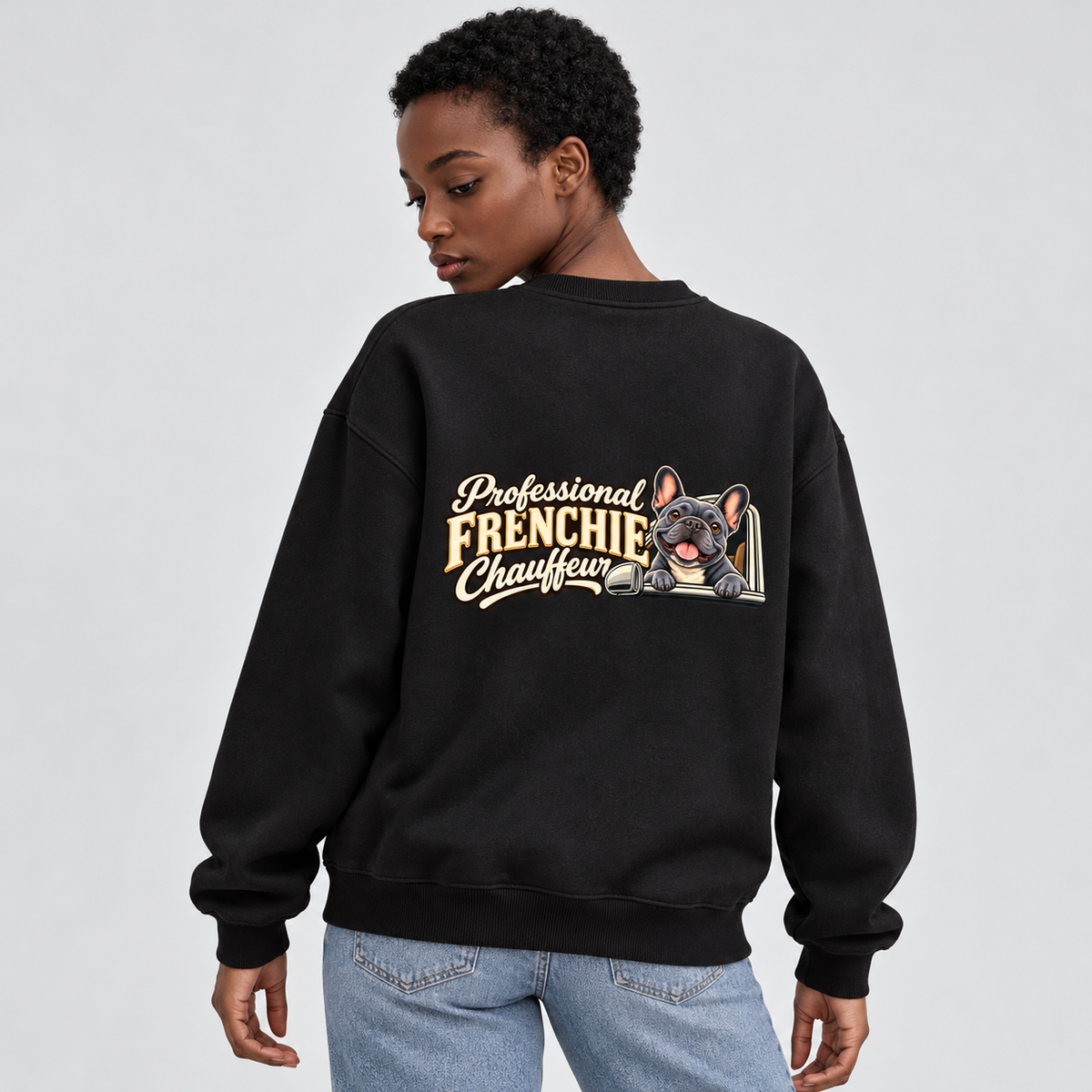 Model wearing a black French Bulldog sweatshirt with Professional Frenchie Chauffeur on the back