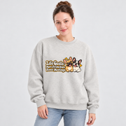 Model wearing a oat gray French Bulldog sweatshirt with Life Goals: More Frenchies. Fewer Meetings. on the front