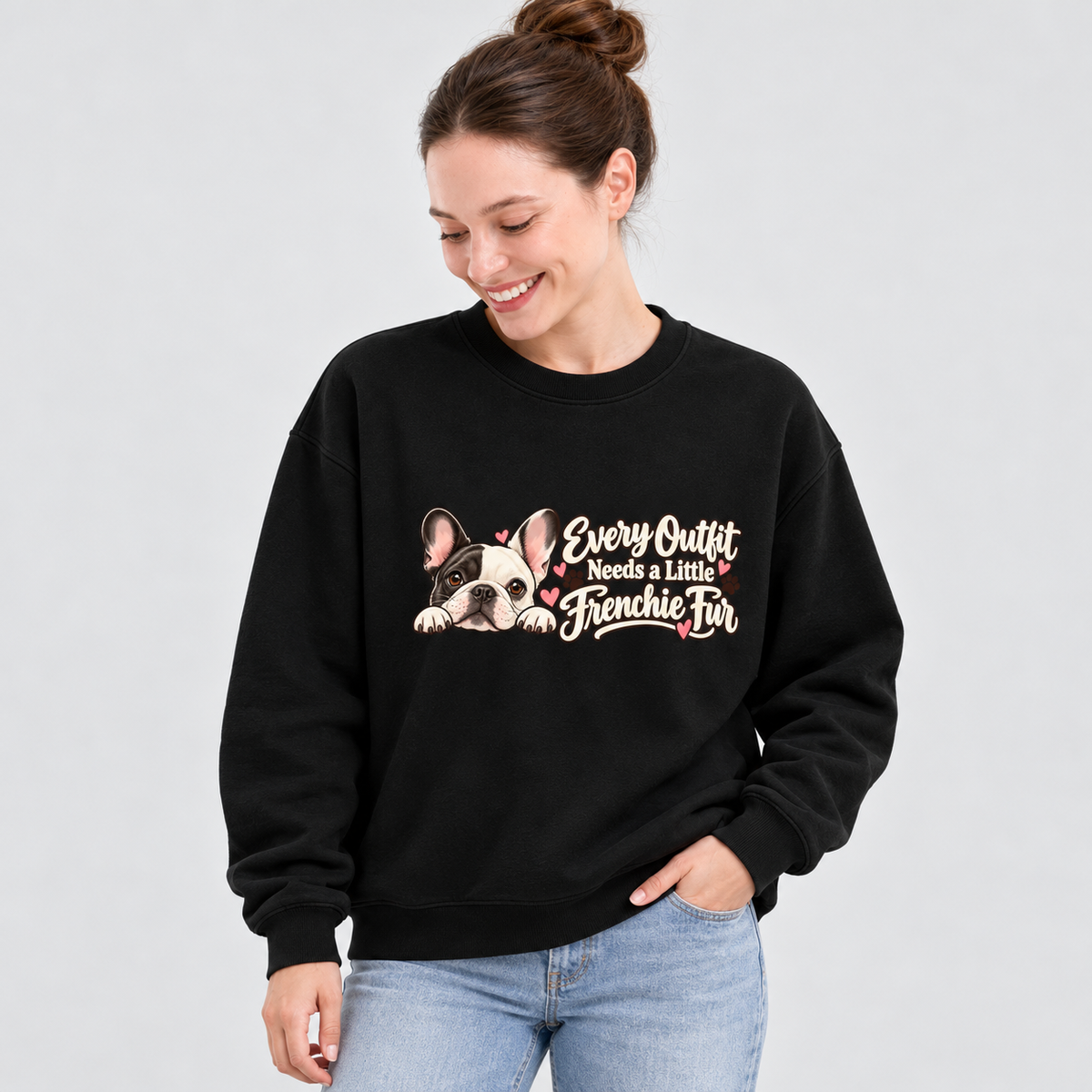 Model wearing a black French Bulldog sweatshirt with Every Outfit Needs a Little Frenchie Fur on the front