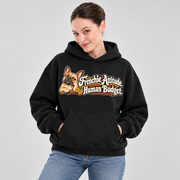 Woman wearing a black French Bulldog hoodie with the Frenchie Attitude. Human Budget front print.