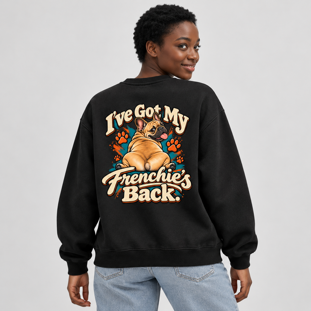 Model wearing a black French Bulldog sweatshirt with I've Got My Frenchie's Back. on the back