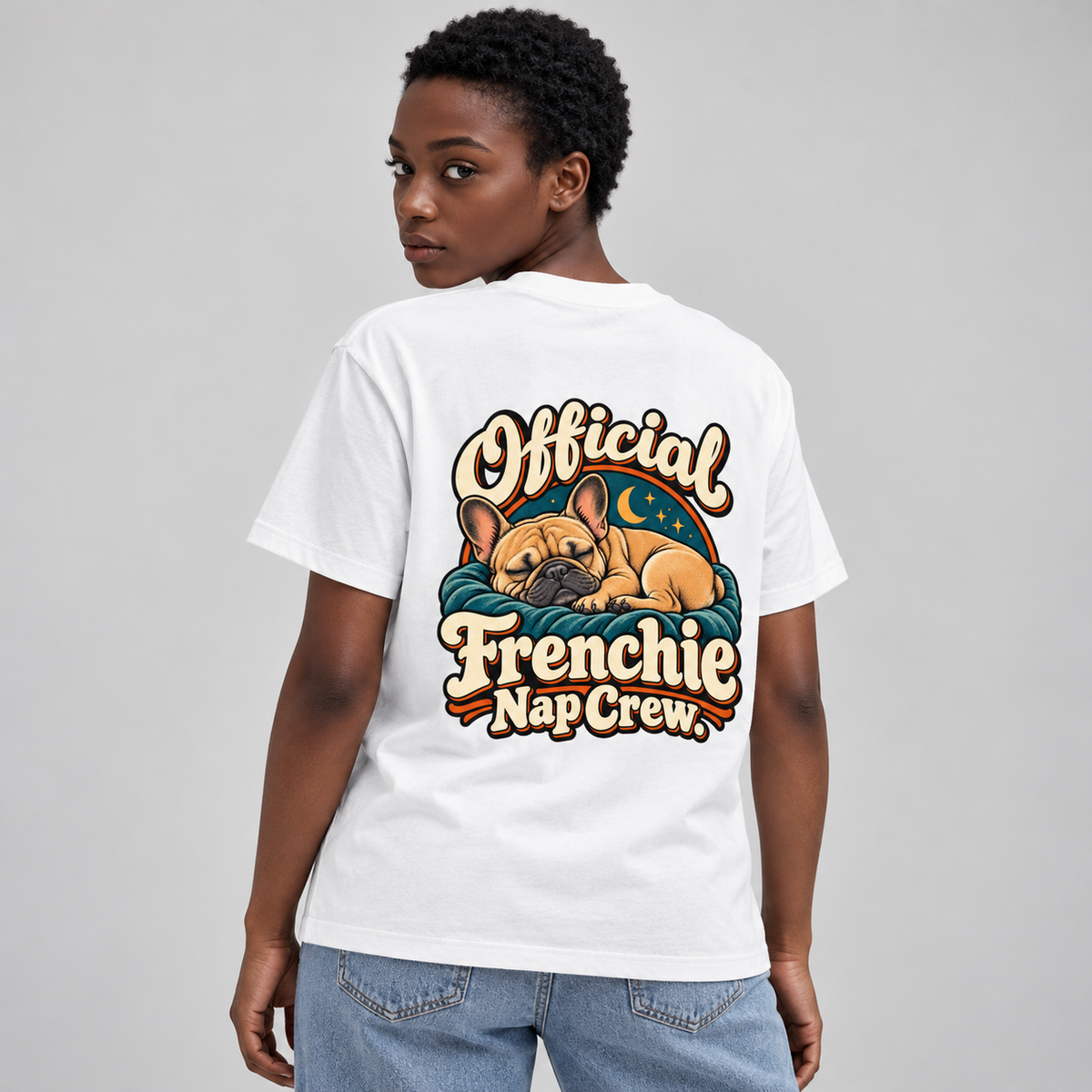 Model wearing a white French Bulldog T-shirt with the Official Frenchie Nap Crew. artwork on the back