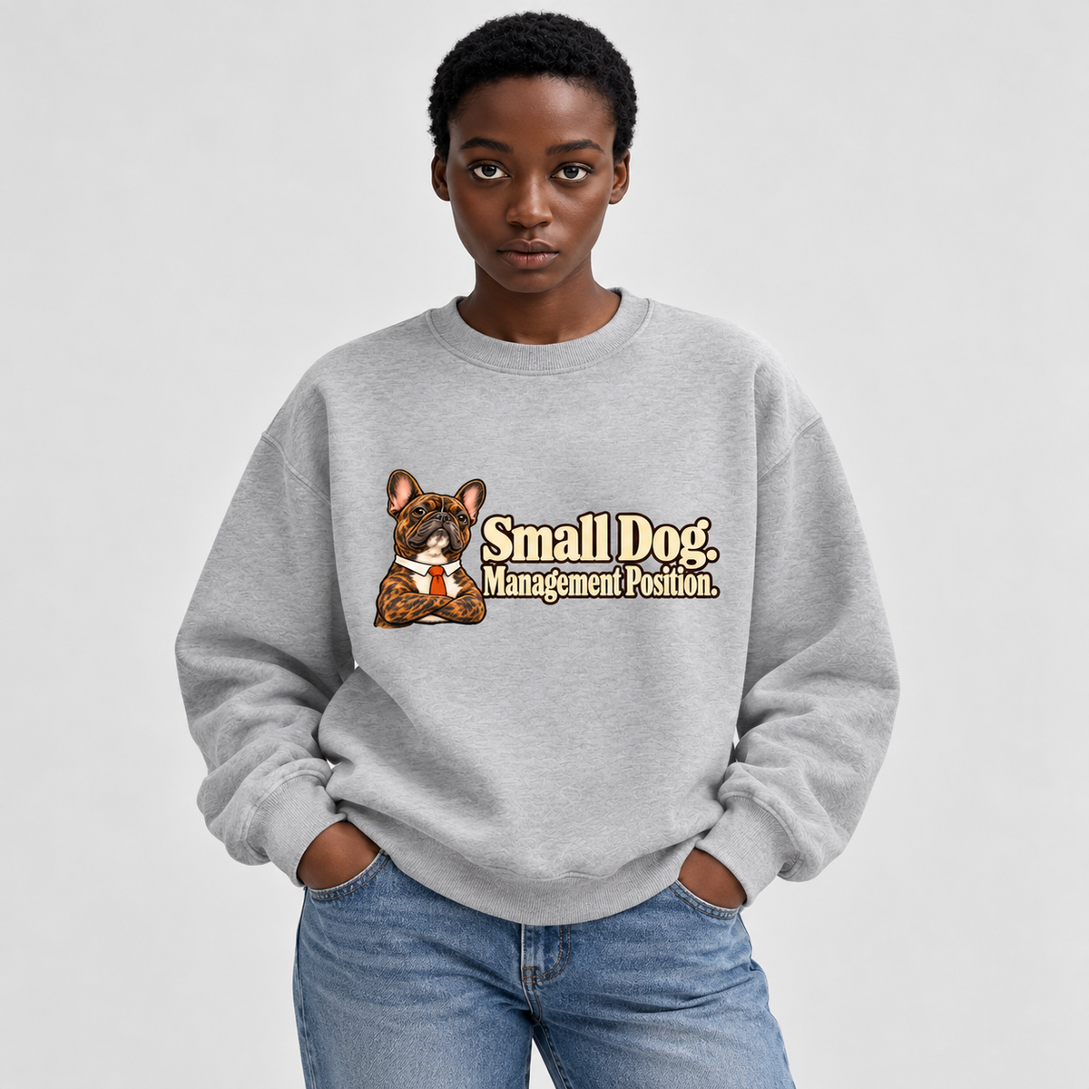 Close-up of Small Dog. Management Position. front artwork on a flower gray fleece sweatshirt