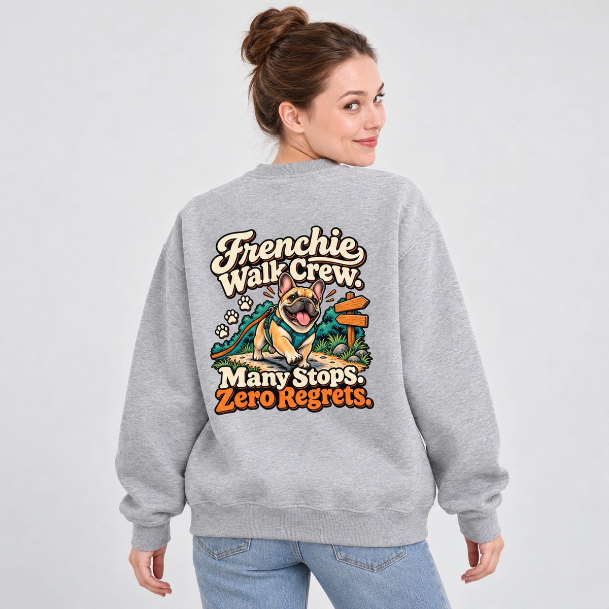 Model wearing a flower gray French Bulldog sweatshirt with Frenchie Walk Crew. Many Stops. Zero Regrets. on the back
