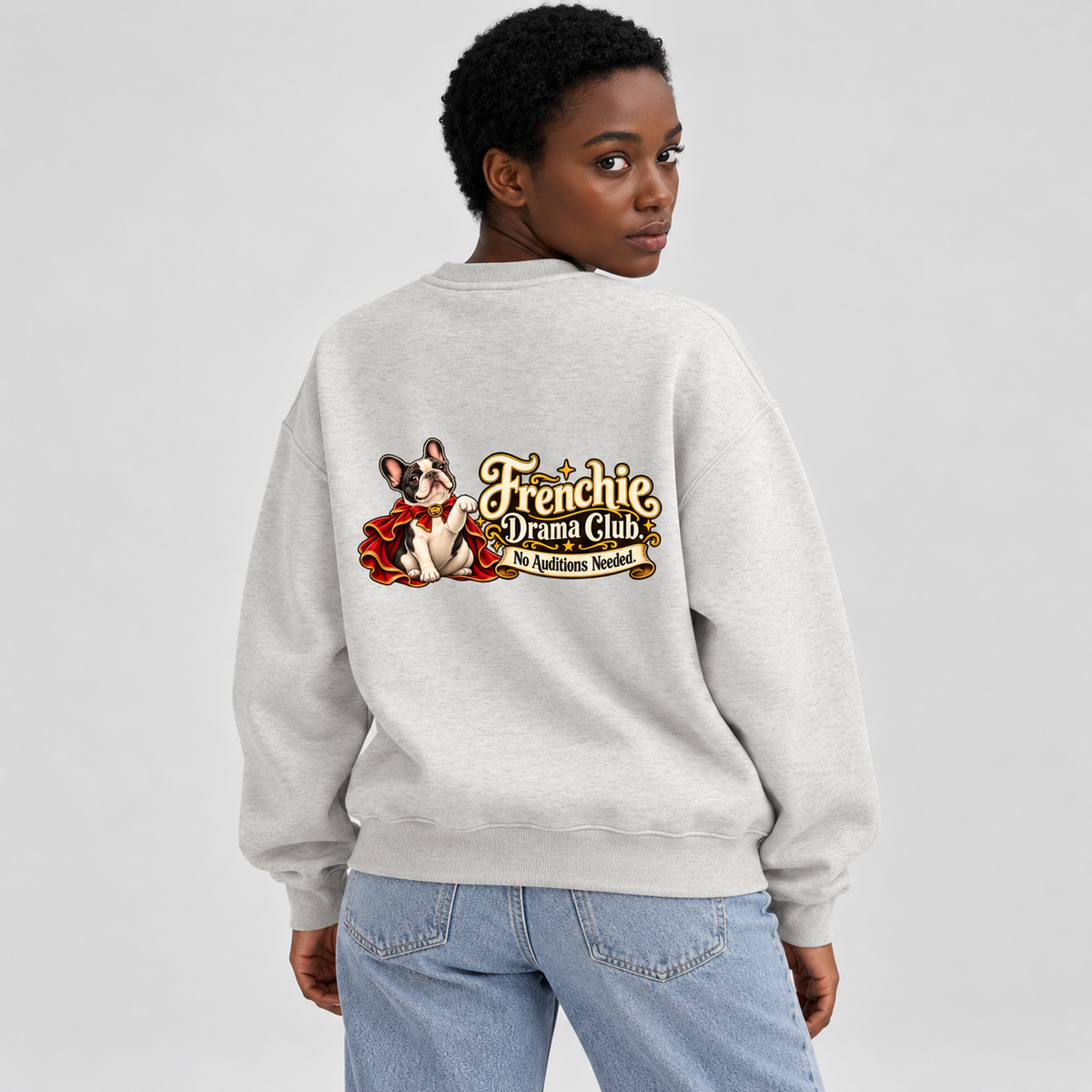 Model wearing a oat gray French Bulldog sweatshirt with Frenchie Drama Club. No Auditions Needed. on the back