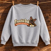 Model wearing a flower gray French Bulldog sweatshirt with Frenchie Dad. Promoted to Treat Dispenser. on the back