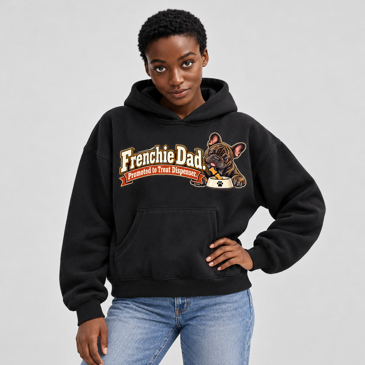Close-up of the Frenchie Dad. Promoted to Treat Dispenser front print on a black French Bulldog hoodie.