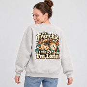 Model wearing a oat gray French Bulldog sweatshirt with My Frenchie Is the Reason I'm Late. on the back