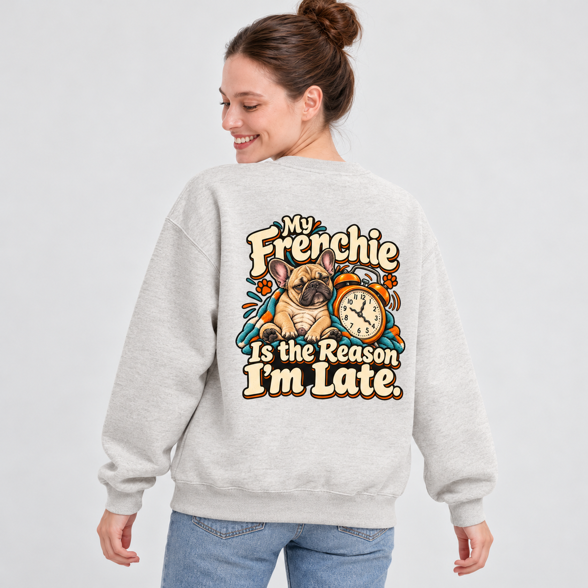 Model wearing a oat gray French Bulldog sweatshirt with My Frenchie Is the Reason I'm Late. on the back