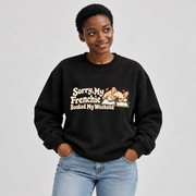Model wearing a black French Bulldog sweatshirt with Sorry, My Frenchie Booked My Weekend on the front