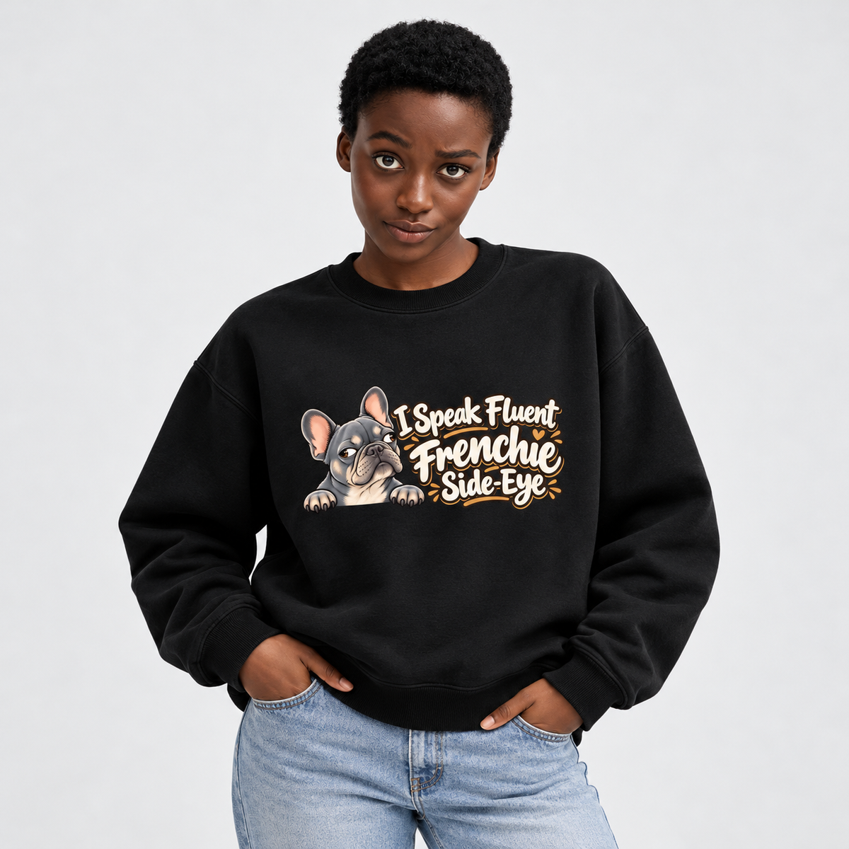 Model wearing a black French Bulldog sweatshirt with I Speak Fluent Frenchie Side-Eye on the front