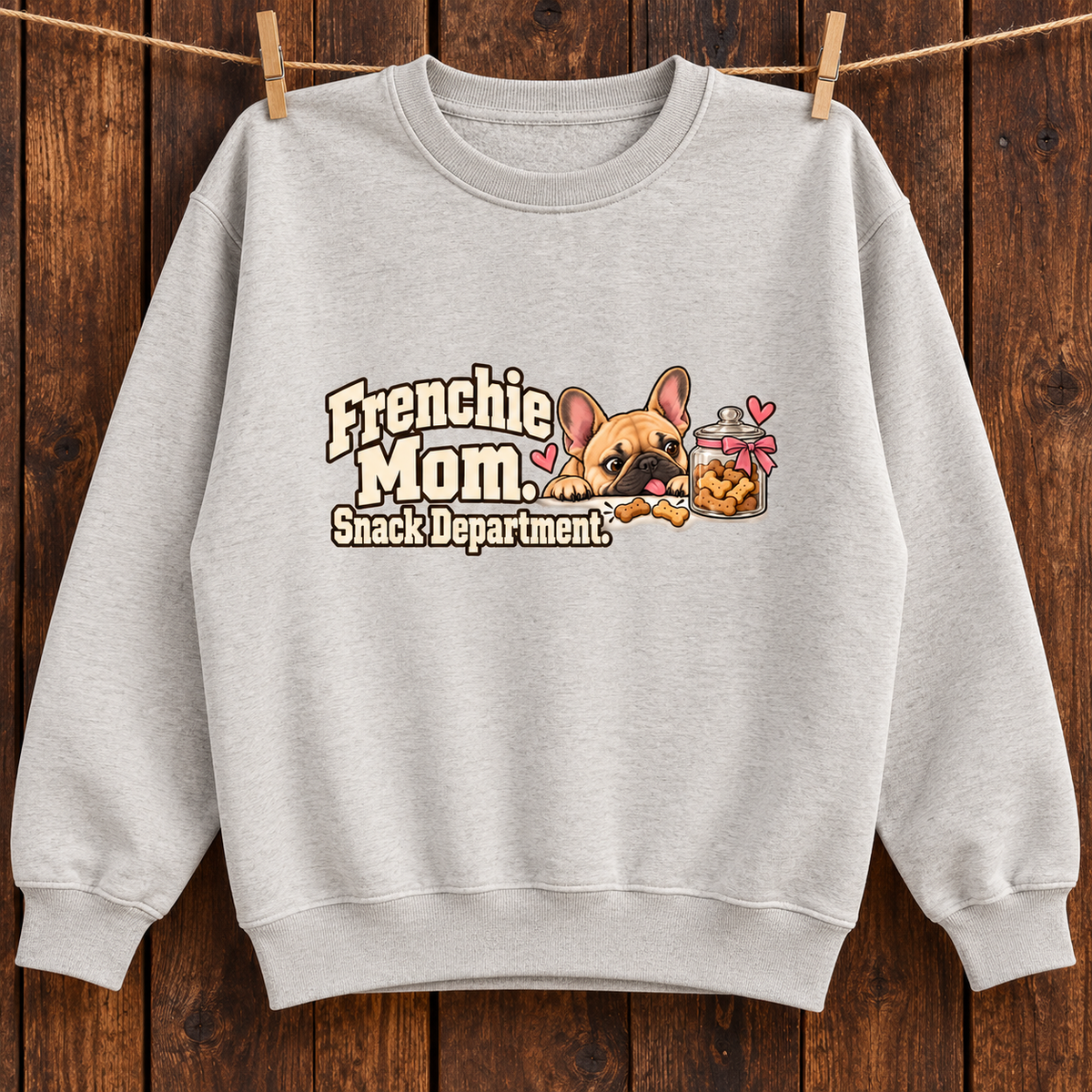 Model wearing a oat gray French Bulldog sweatshirt with Frenchie Mom. Snack Department. on the front