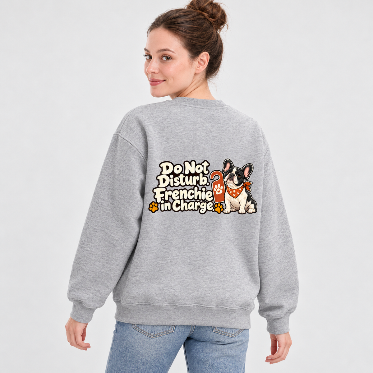Close-up of Do Not Disturb. Frenchie in Charge. back artwork on a flower gray fleece sweatshirt