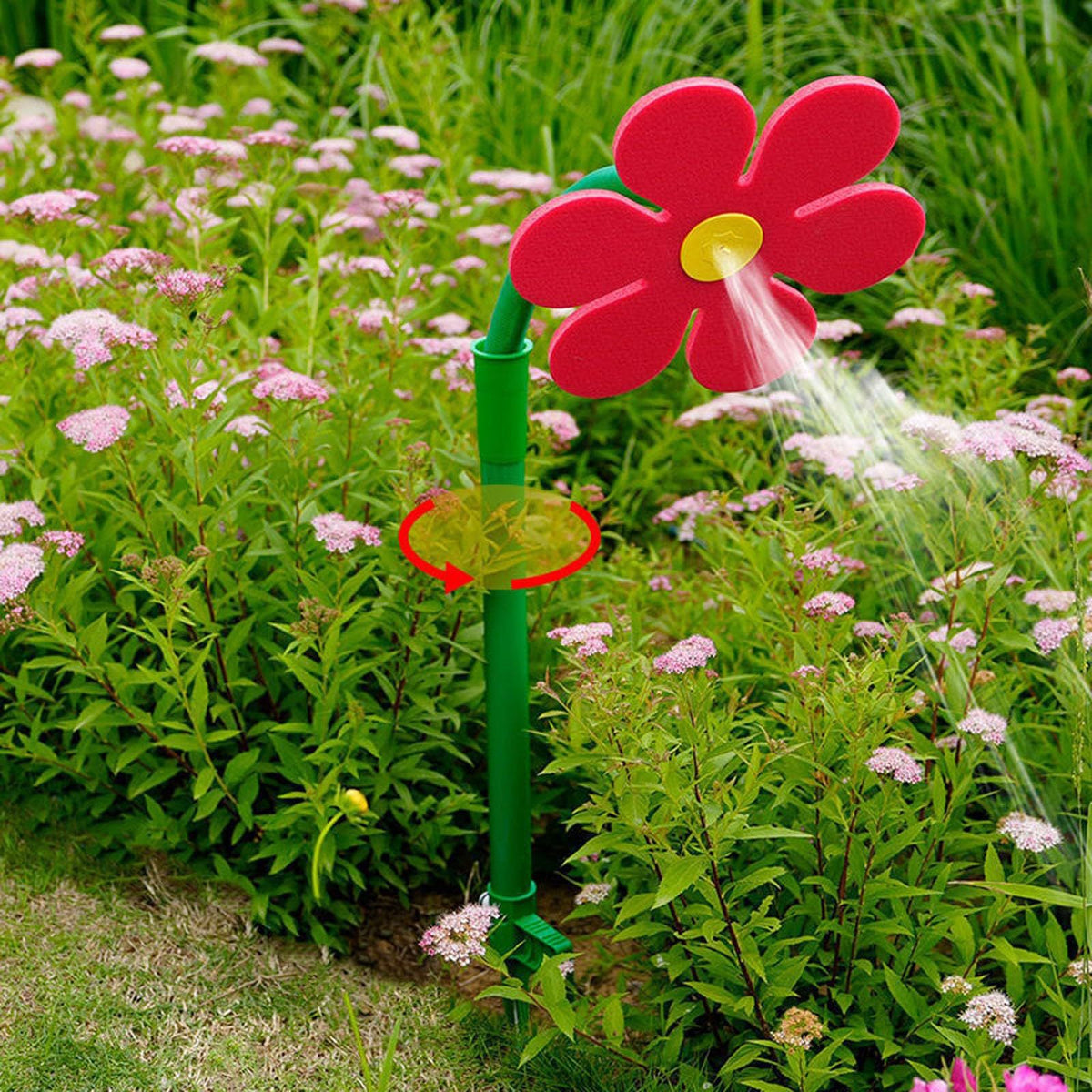 Rotating daisy garden sprinkler in yellow