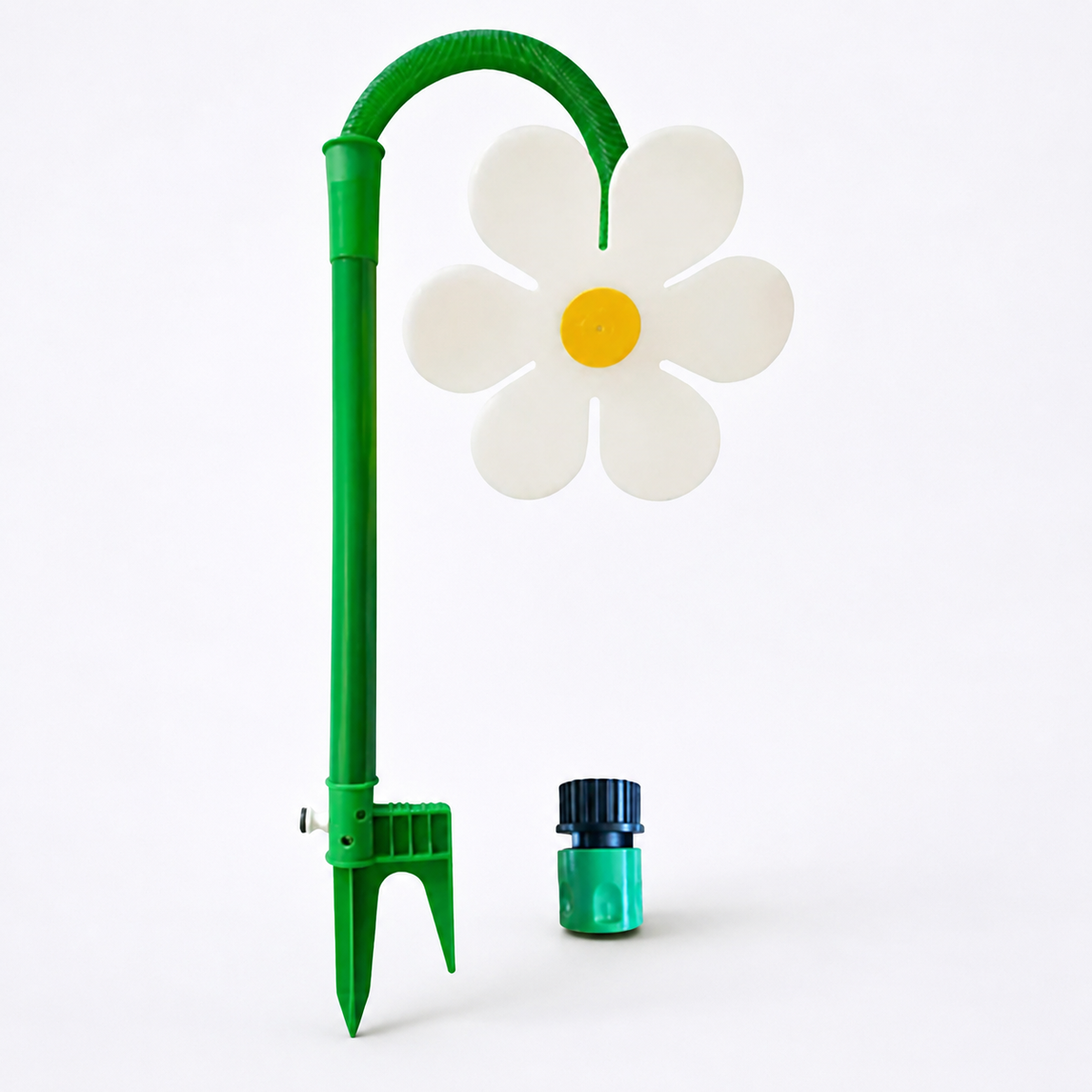 Rotating daisy garden sprinkler in yellow