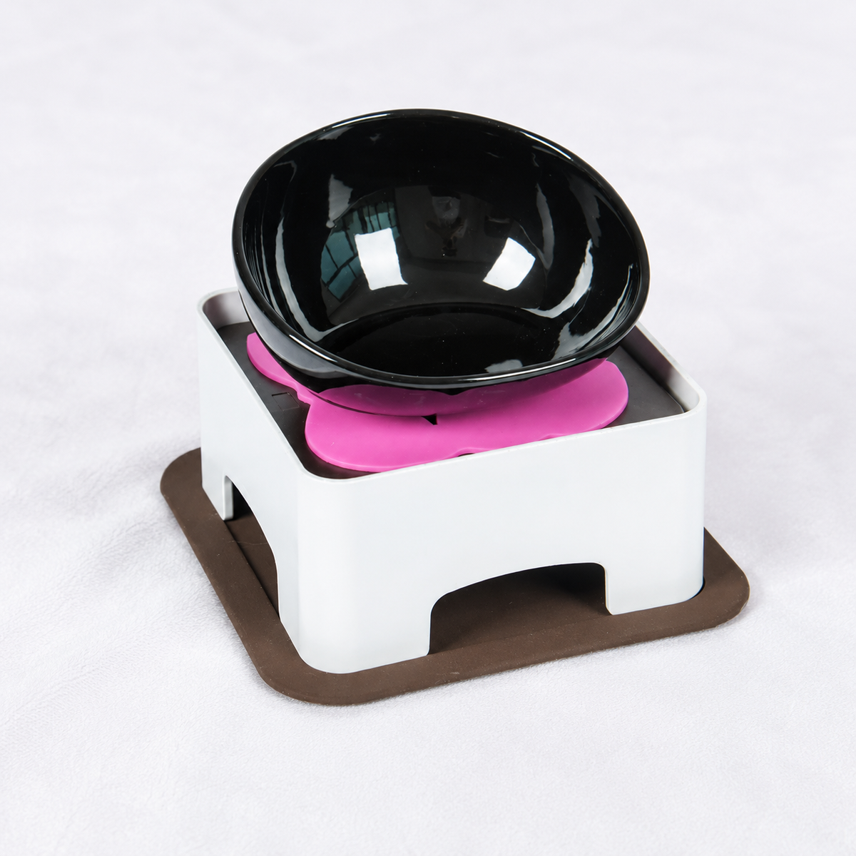 Tilted ceramic elevated dog bowl for Frenchies on an adjustable stand