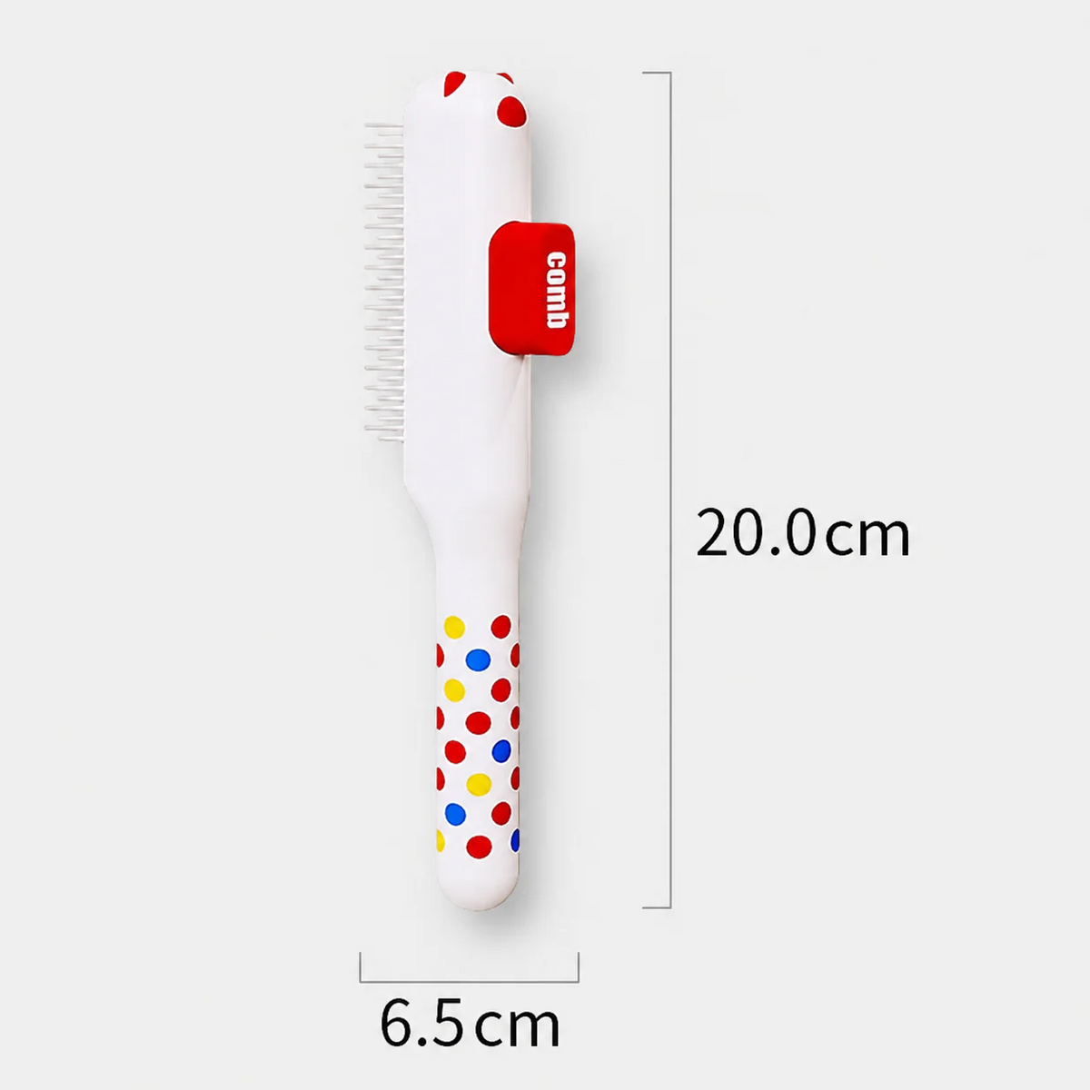 Self-cleaning Frenchie brush that clears the comb in one press
