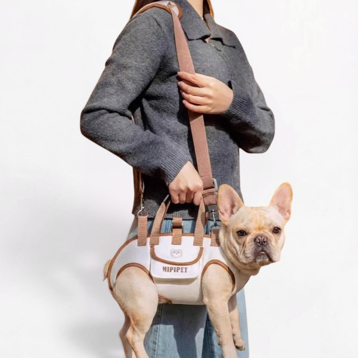 Crossbody sling carrier for French Bulldogs that wraps and supports the torso