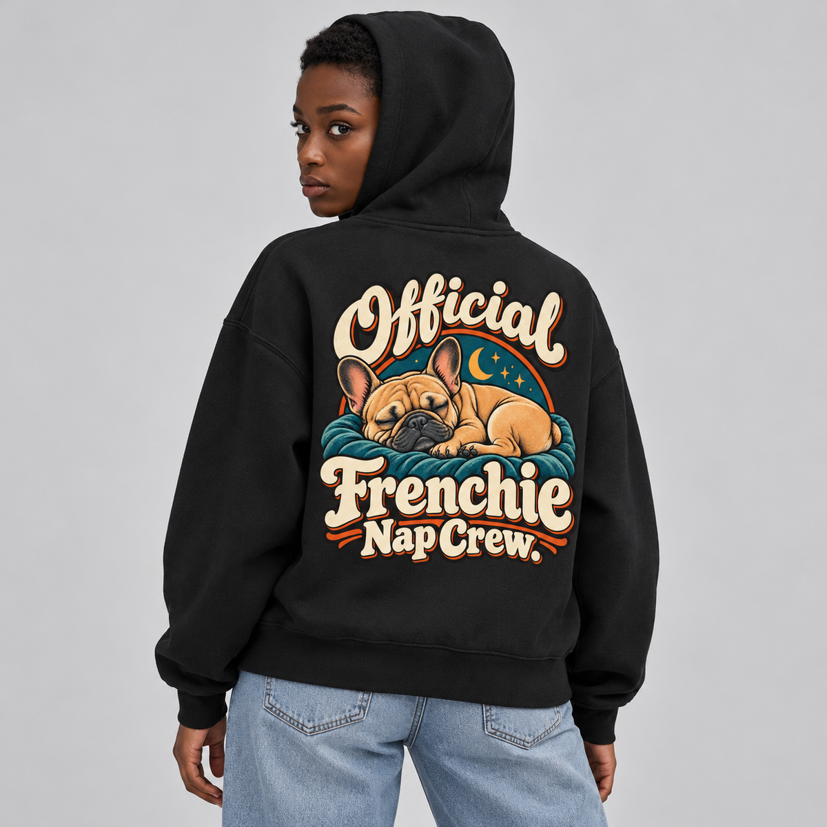 Close-up of the Official Frenchie Nap Crew back print on a black French Bulldog hoodie.