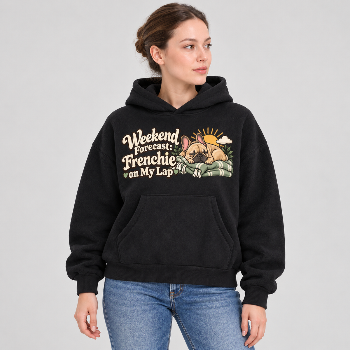 Woman wearing a black French Bulldog hoodie with the Weekend Forecast: Frenchie on My Lap front print.