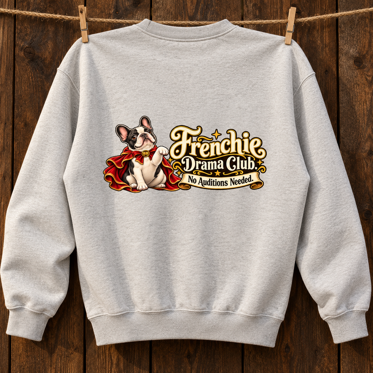 Close-up of Frenchie Drama Club. No Auditions Needed. back artwork on a oat gray fleece sweatshirt
