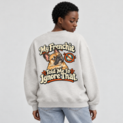 Model wearing a oat gray French Bulldog sweatshirt with My Frenchie Told Me to Ignore That. on the back