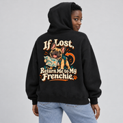 Woman wearing a black French Bulldog hoodie with the If Lost, Return Me to My Frenchie back print.
