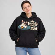 Woman wearing a black French Bulldog hoodie with the My Frenchie Thinks I'm the Staff front print.