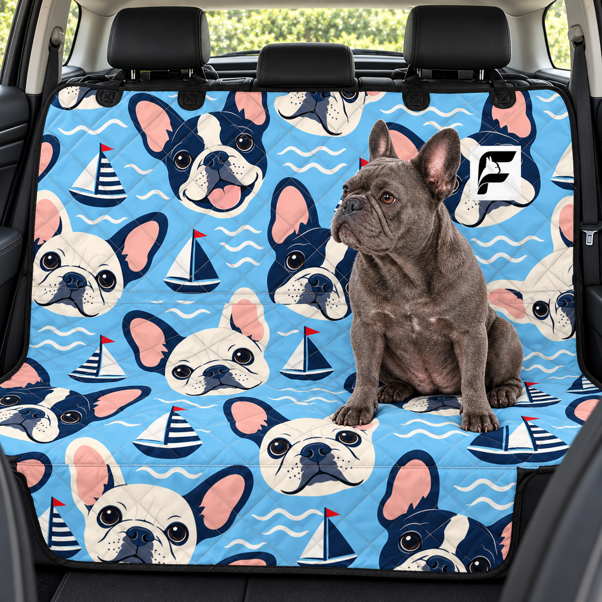 Coastal Frenchie Club Frenchie-pattern car seat protector installed across rear bench with French Bulldog