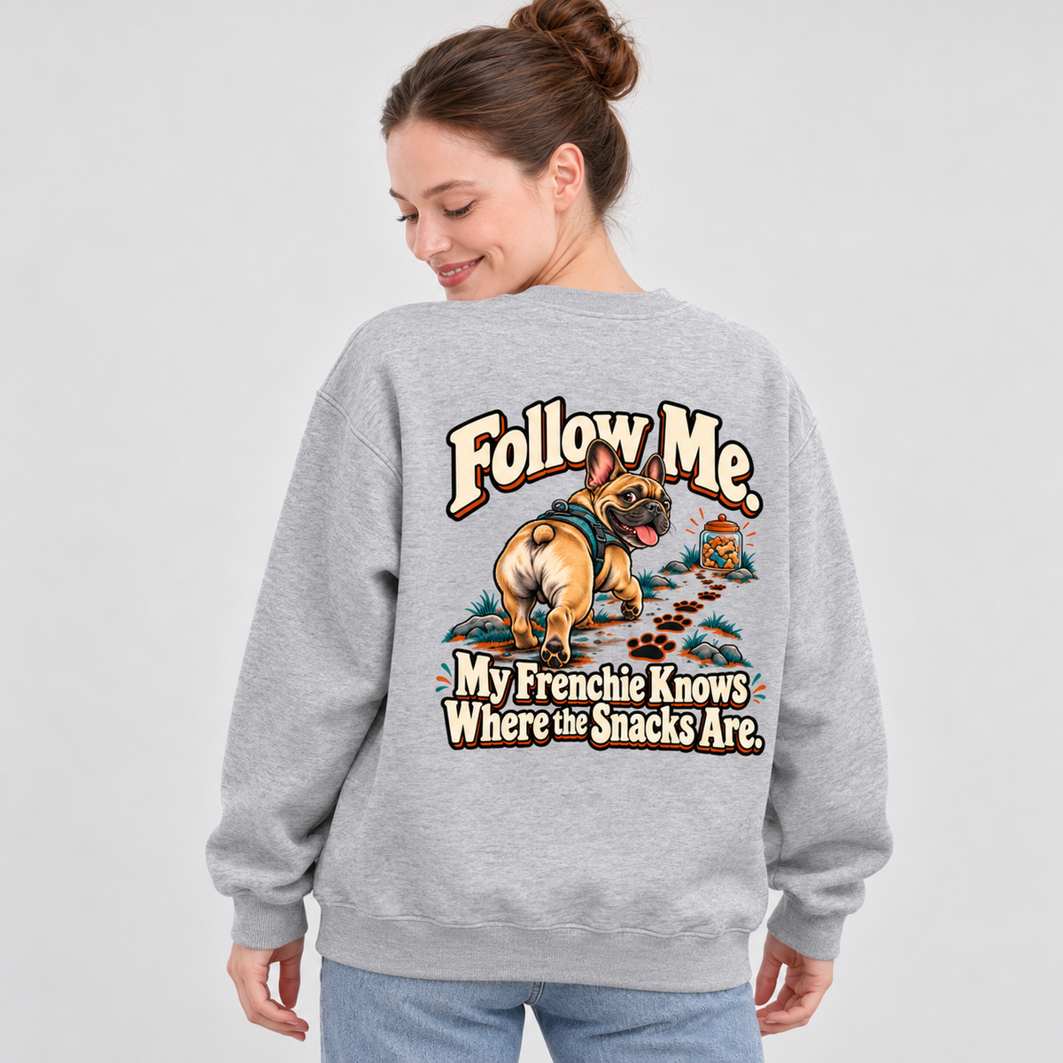 Close-up of Follow Me. My Frenchie Knows Where the Snacks Are. back artwork on a flower gray fleece sweatshirt