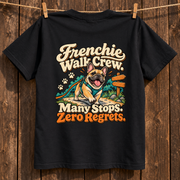 Model wearing a black French Bulldog T-shirt with the Frenchie Walk Crew. Many Stops. Zero Regrets. artwork on the back