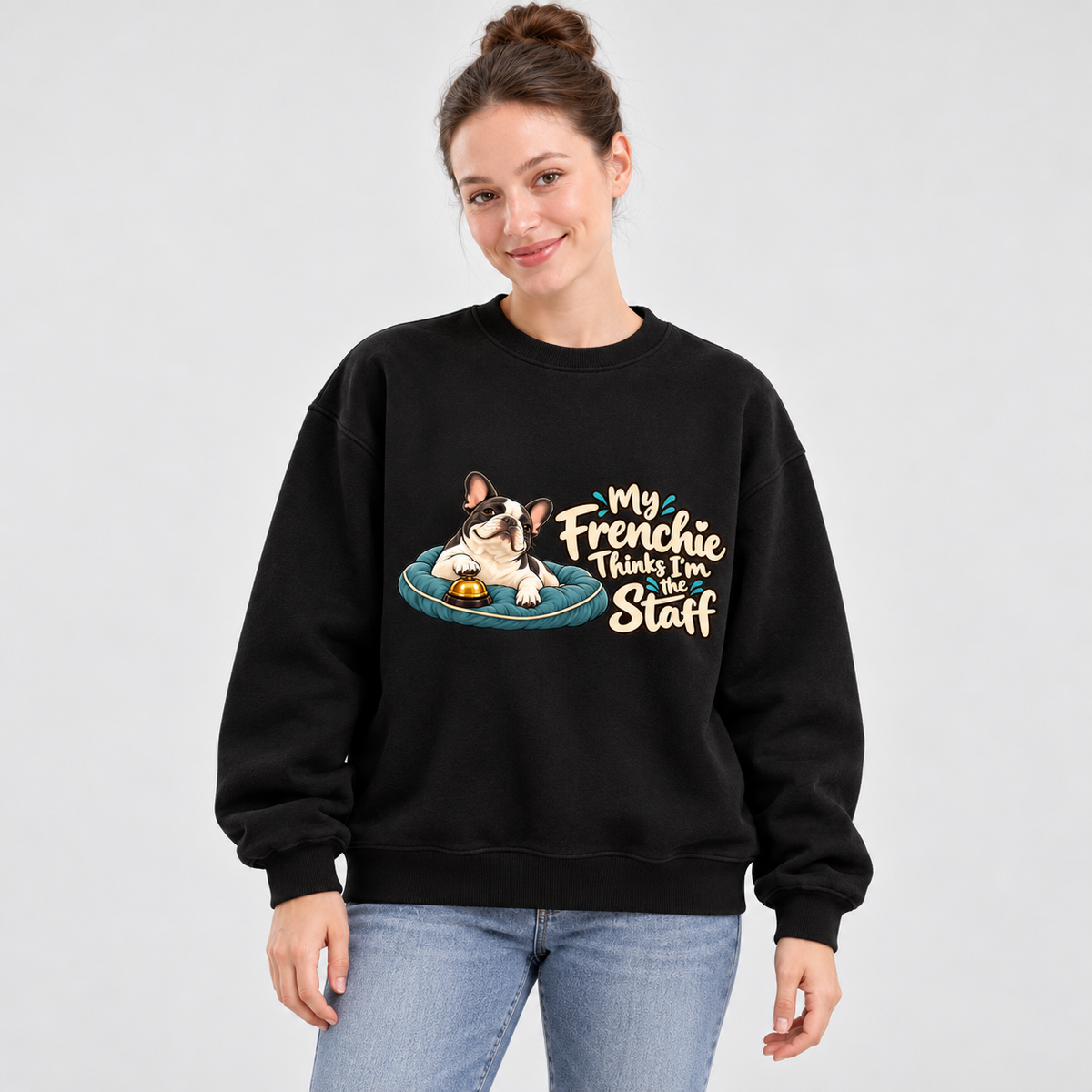 Close-up of My Frenchie Thinks I'm the Staff front artwork on a black fleece sweatshirt