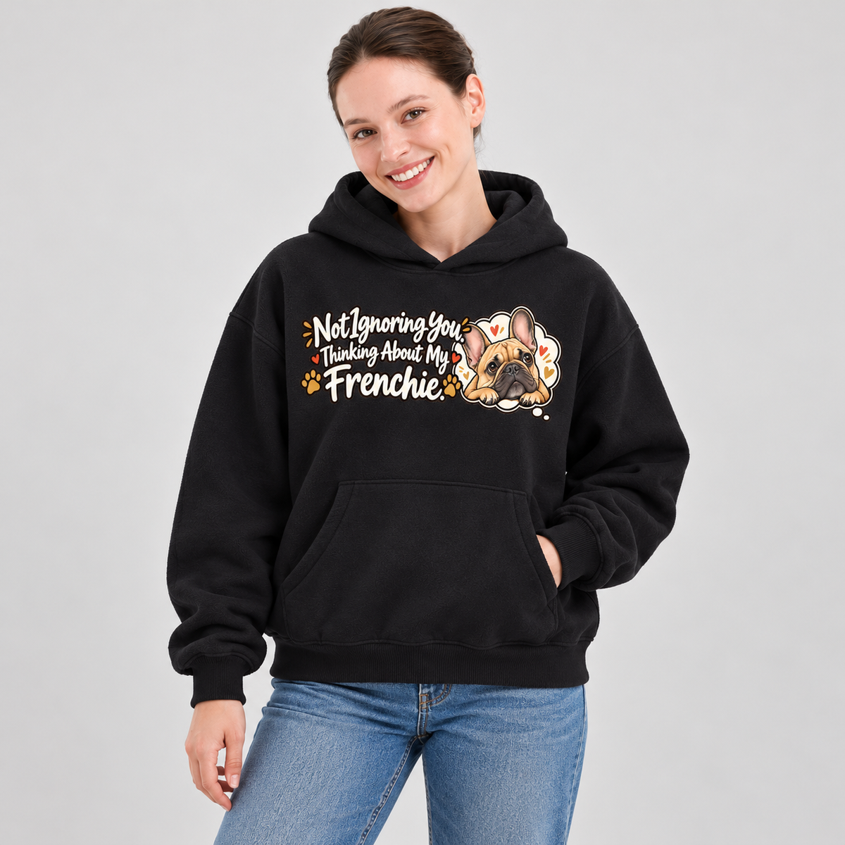 Close-up of the Not Ignoring You. Thinking About My Frenchie front print on a black French Bulldog hoodie.