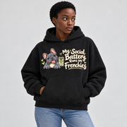 Woman wearing a black French Bulldog hoodie with the My Social Battery Runs on Frenchies front print.