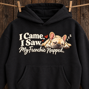 Woman wearing a black French Bulldog hoodie with the I Came. I Saw. My Frenchie Napped front print.