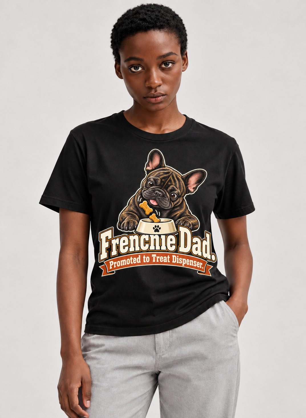Black French Bulldog T-shirt — Frenchie Dad. Promoted to Treat Dispenser. — large print on model