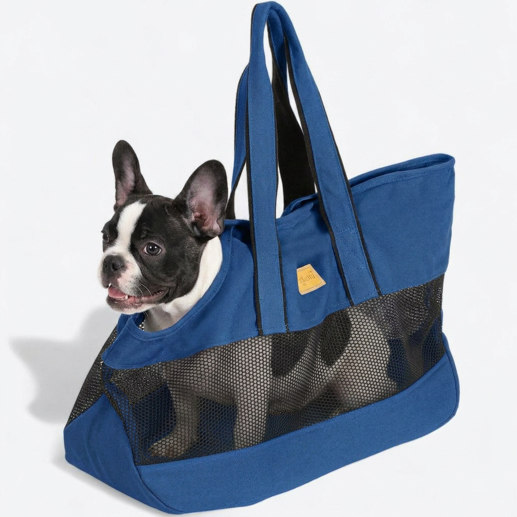 French Bulldog in blue mesh ventilation carrier