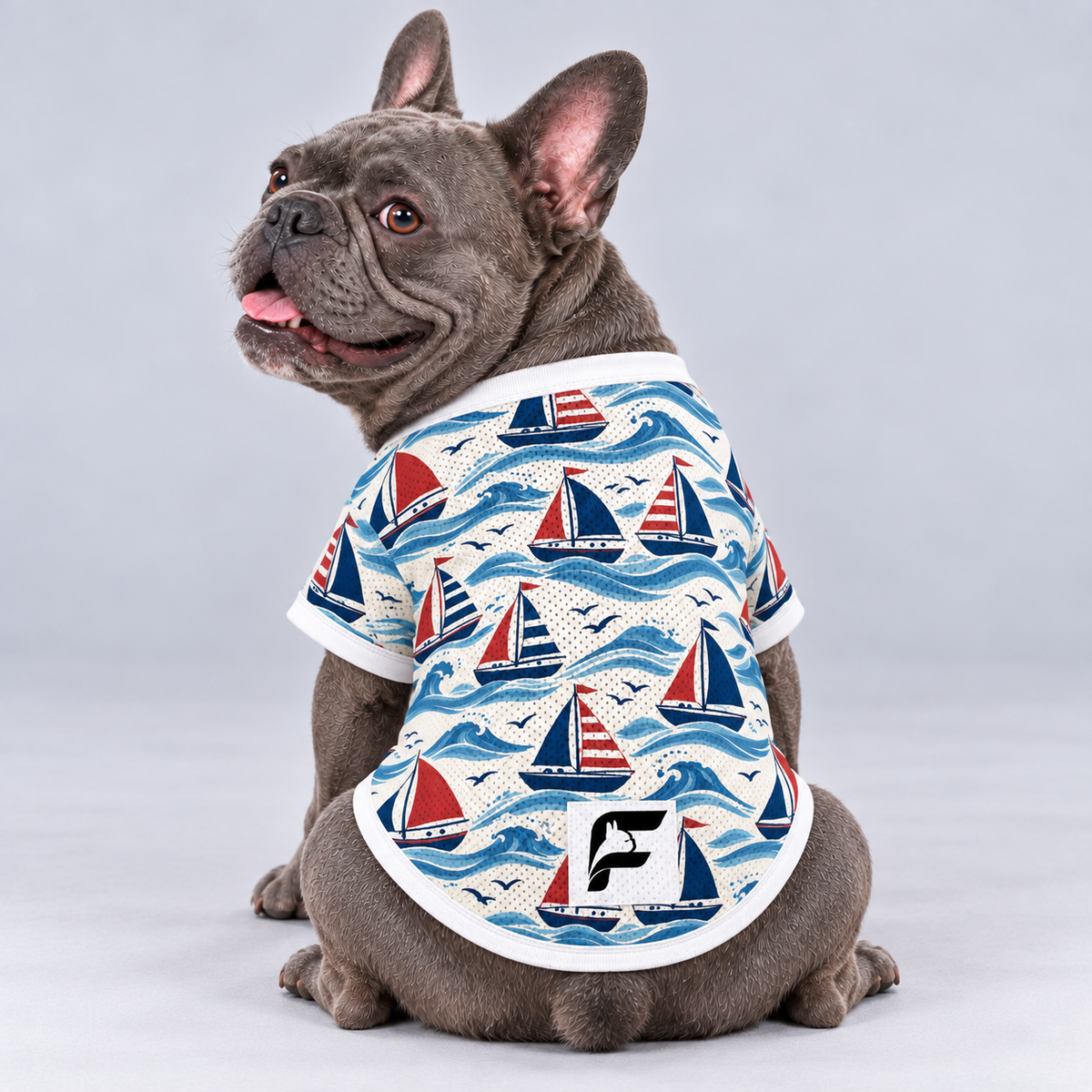 Little Sailboats mesh dog shirt, back view on our Frenchie model with signature white-square logo