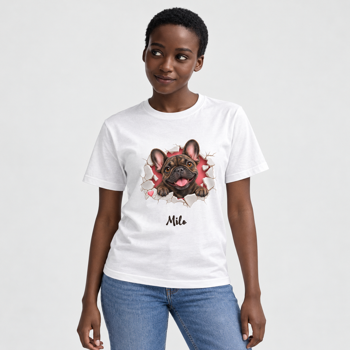 Approved model wearing the personalized brindle Frenchie white T-shirt on a light gray studio background