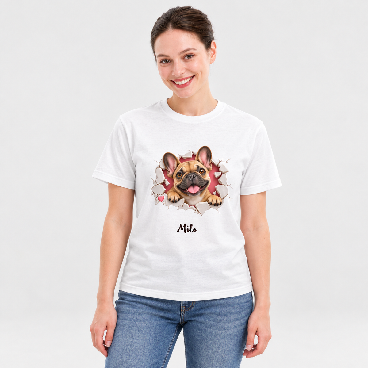 Approved model wearing the personalized fawn Frenchie white T-shirt on a light gray studio background