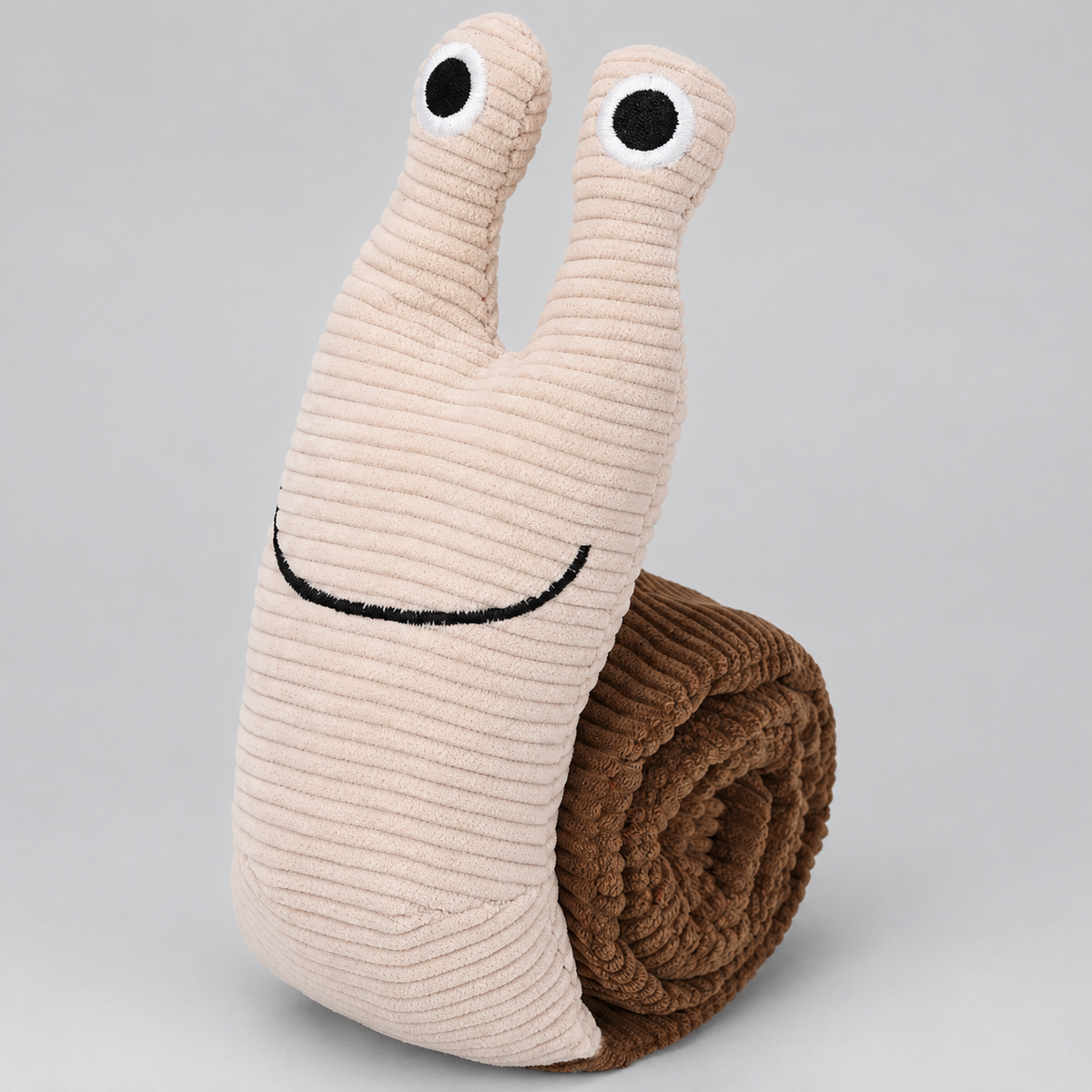 Unrolling Snail French Bulldog Snuffle Toy — Beige Brown studio photo