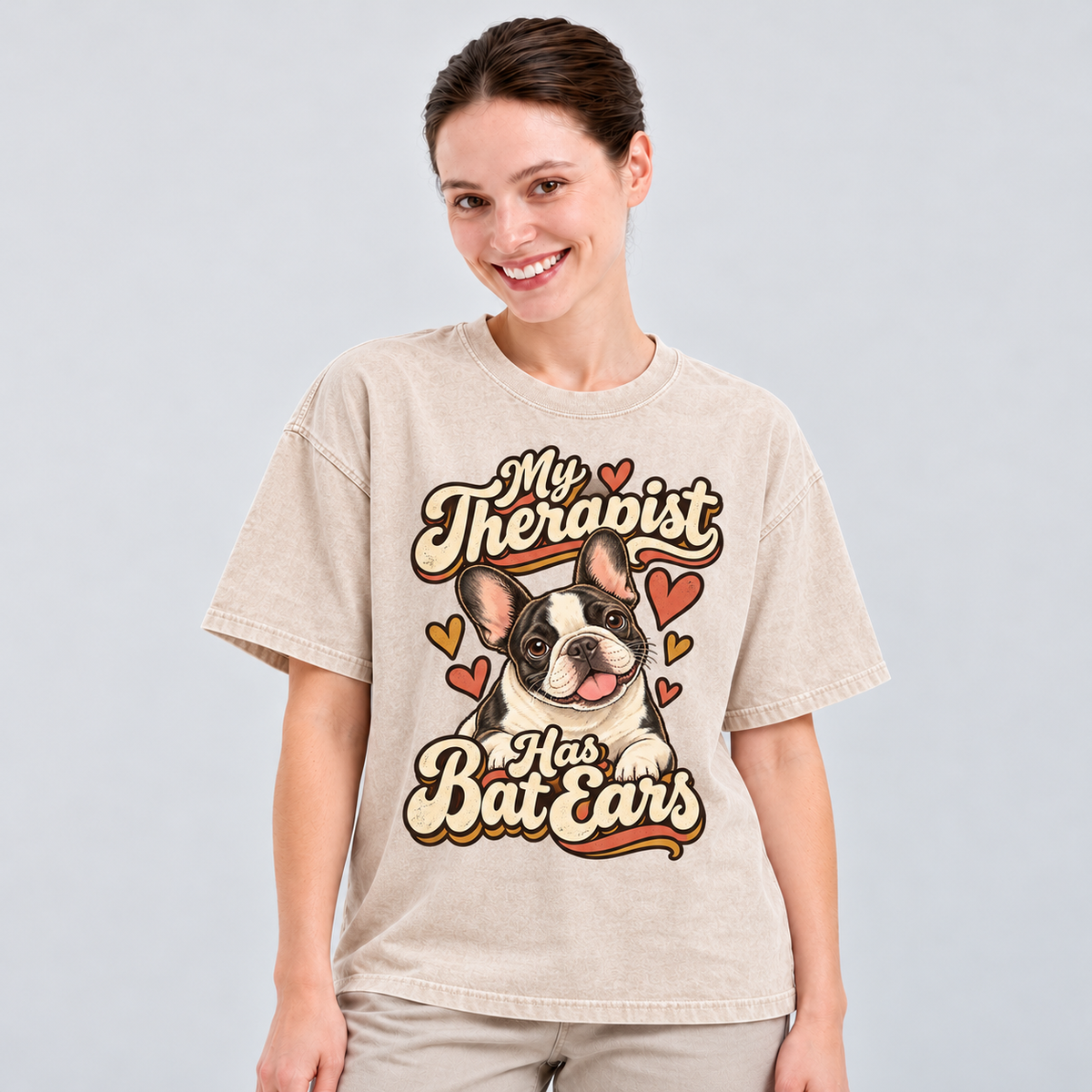 My Therapist Has Bat Ears — Apricot washed cotton French Bulldog T-shirt on our model